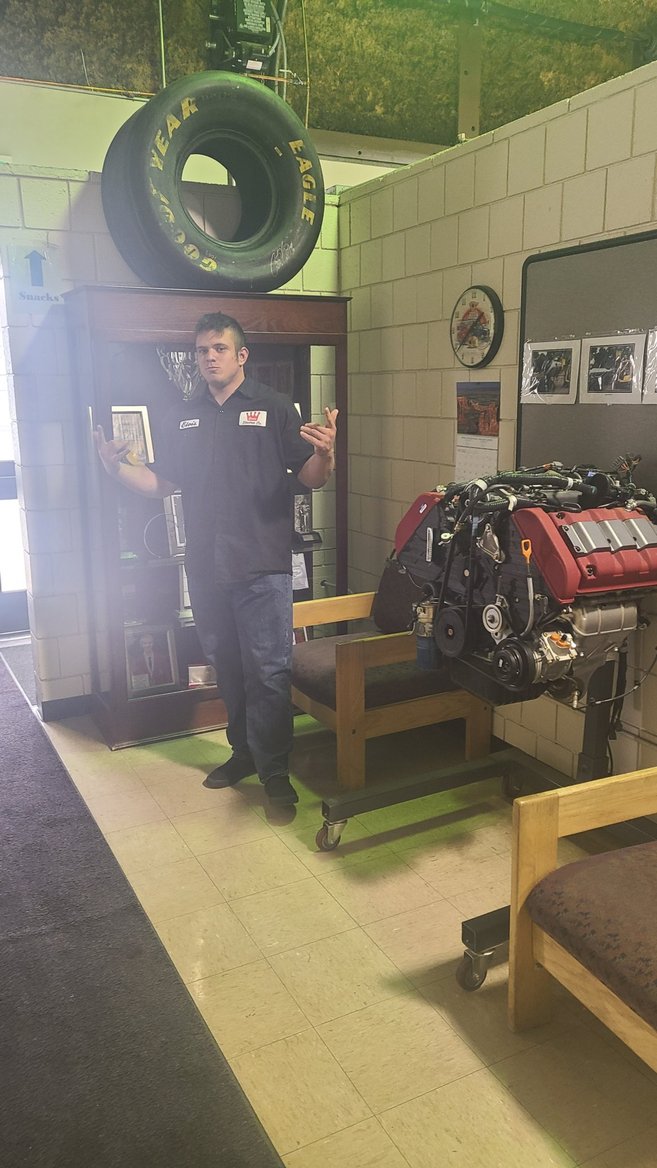 Automotive workshop with engine stand